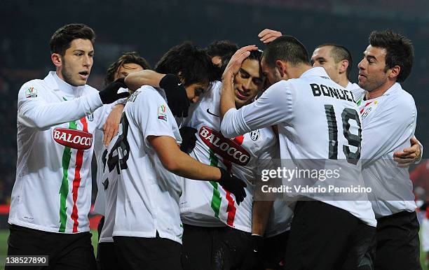 Martin Caceres of Juventus FC celebrates with his team-mates after scoring the second goal during the Tim Cup match between AC Milan and Juventus FC...