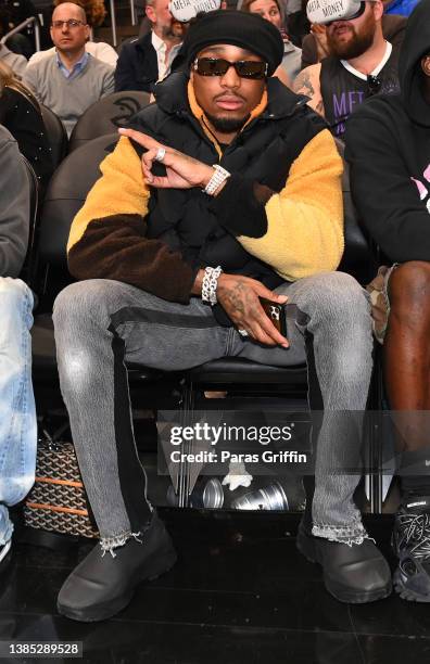 Rapper Quavo of the Migos attends the game between the Portland Trail Blazers and the Atlanta Hawks at State Farm Arena on March 14, 2022 in Atlanta,...