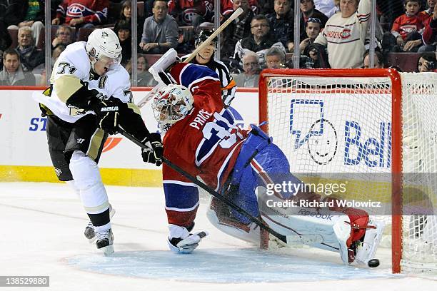 Evgeni Malkin of the Pittsburgh Penguins spins to shoot and score his shootout attempt on Carey Price of the Montreal Canadiens during the NHL game...