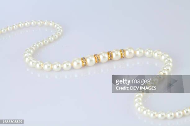 pearl necklace - bead necklace stock pictures, royalty-free photos & images
