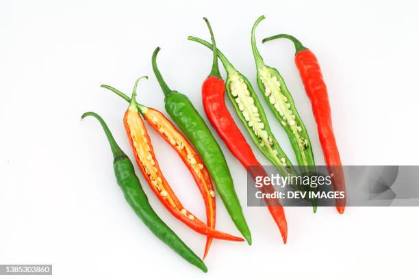 hot chilli or chilli peppers isolated - picadillo fotografías e imágenes de stock