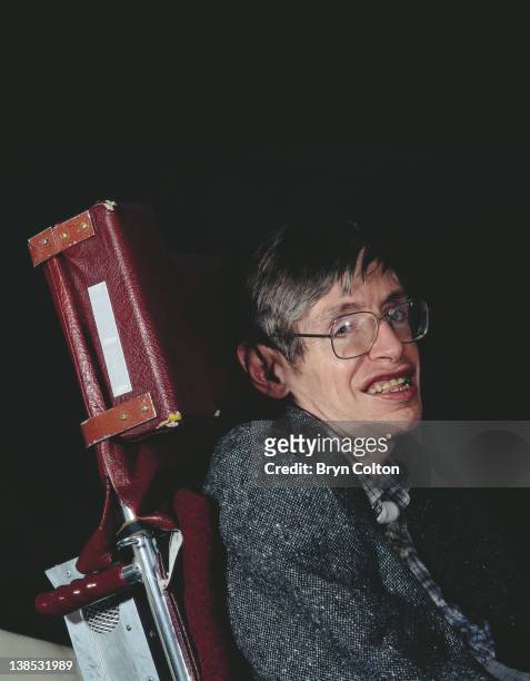 Professor Stephen Hawking poses for a photograph in his office at the University of Cambridge in Cambridge, U.K, in April 1991. Hawking has written...