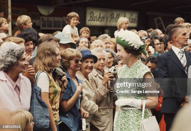 Queen Elizabeth II meets the crowds during her royal tour of New Zealand, 1977.