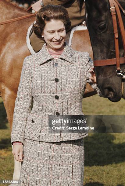 Queen Elizabeth II at a Windsor Horse Show, circa 1975.