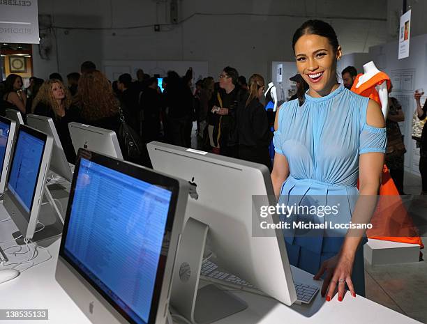 Actress Paula Patton attends eBay Celebrity and Brad Pitt's Make It Right Celebrate Pop-Up Gallery Exhibition at Chelsea Market on February 8, 2012...