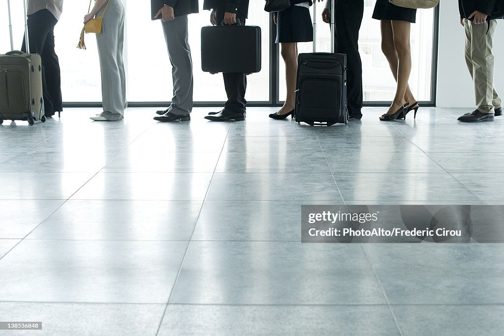 People standing in line, low section