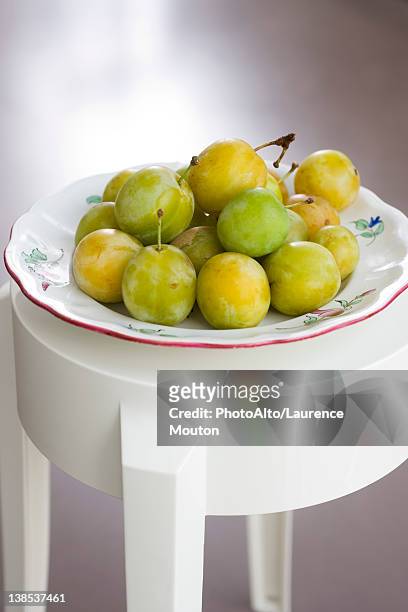 greengage plums in bowl - greengage stock pictures, royalty-free photos & images