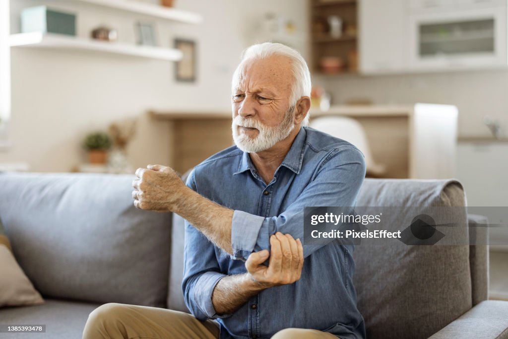 Senior man with Elbow Pain