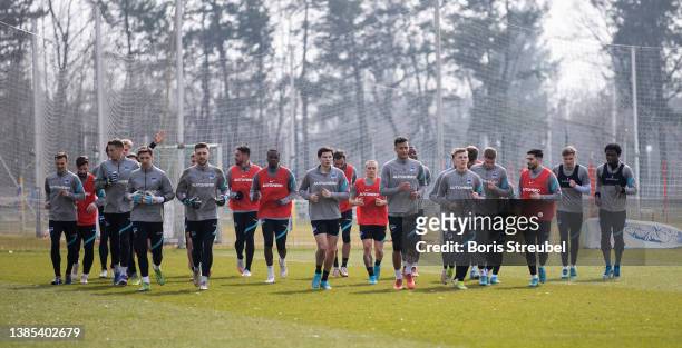 Players of Hertha BSC run during a training session of Hertha BSC, the first training with the new head coach Felix Magath on March 15, 2022 in...