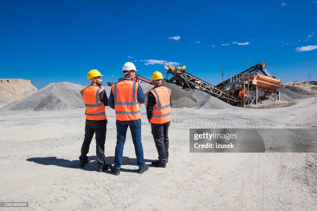 Back view of open-pit mine workers