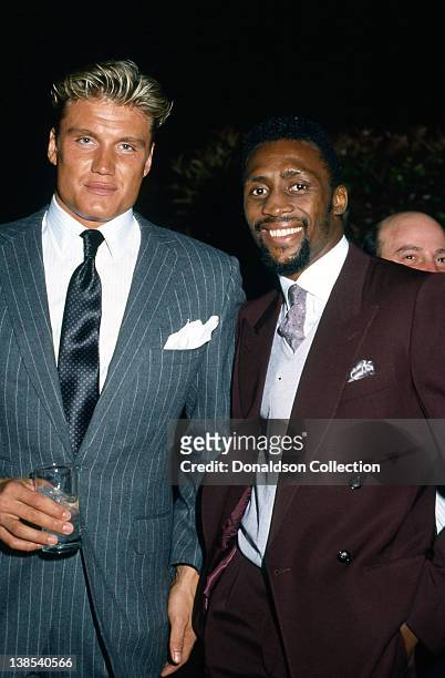 Actor Dolph Lundgren and boxer Thomas Hearns attend an event in 1986 in Los Angeles, California.
