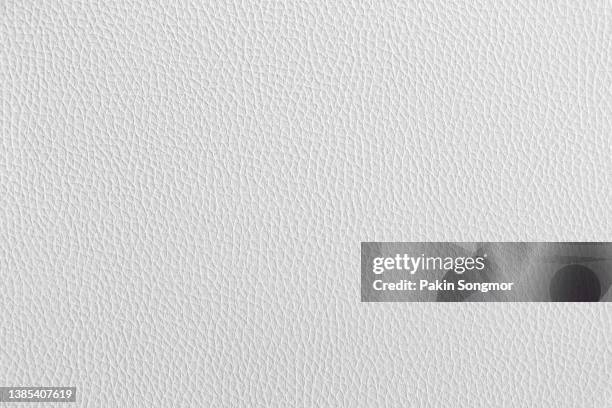 close-up of a white leather and textured background. - auto sofa stock-fotos und bilder