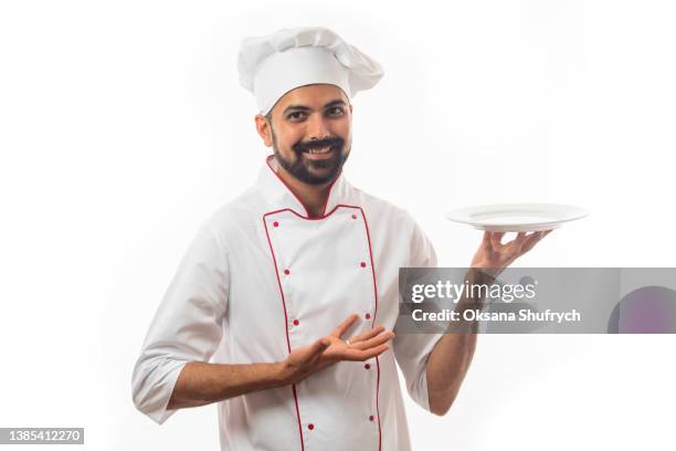 cooking chef with empty plate - chefs hat stock pictures, royalty-free photos & images