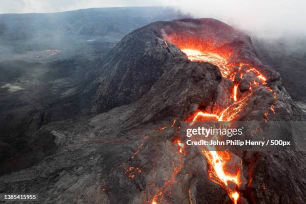 aerial view of lava with steam emitting smoke - stratovolcano stock pictures, royalty-free photos & images