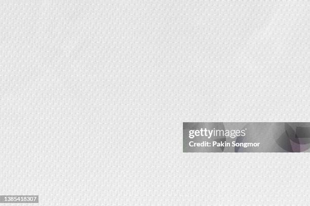 white fabric cloth polyester texture and textile background. - jersey top stockfoto's en -beelden