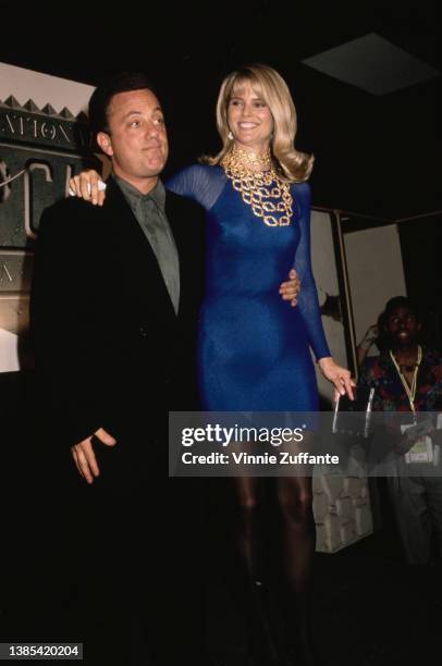 American singer-songwriter and musician Billy Joel and his wife, American model Christie Brinkley, attend the 2nd International Rock Awards, held at...