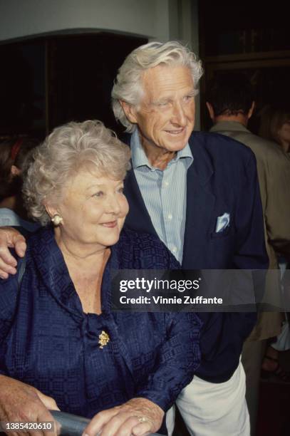 American actress Dorothy Bridges and her husband, American actor Lloyd Bridges attend the Westwood premiere of 'Blown Away,' held at Mann's National...