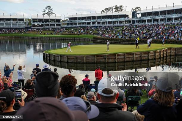 General view is seen as Cameron Smith of Australia waves on the 17th green during the final round of THE PLAYERS Championship on the Stadium Course...
