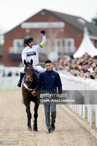 Nico de Boinville on Constitution Hill celebrates after winning the Sky Bet Supreme Novices' Hurdle race during day one of the Cheltenham Festival...