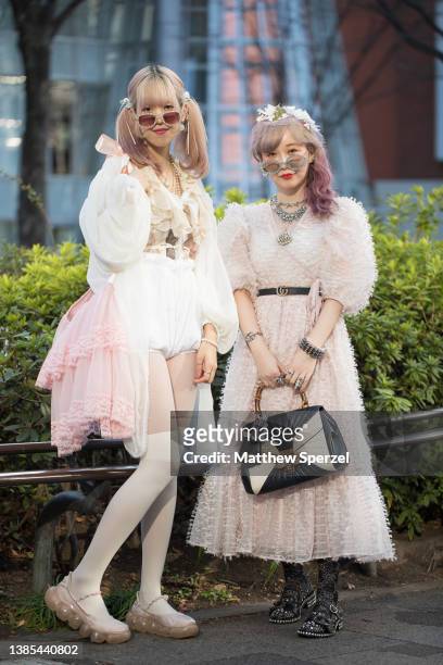 Guests are seen wearing bright outfits outside Omotesando Hills during Rakuten Fashion Week Tokyo 2022 A/W on March 15, 2022 in Tokyo, Japan.