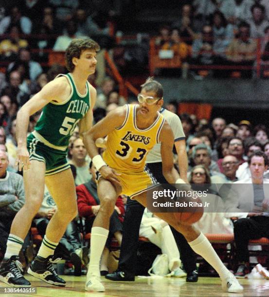 Kareem Abdul-Jabbar battles Greg Kite during 1985 NBA Finals between Los Angeles Lakers and Boston Celtics, June 2, 1985 in Inglewood, California.