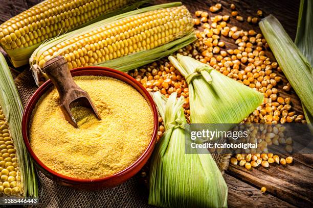 bowl with corn grits, dried corn and pamonha - cornmeal stock pictures, royalty-free photos & images