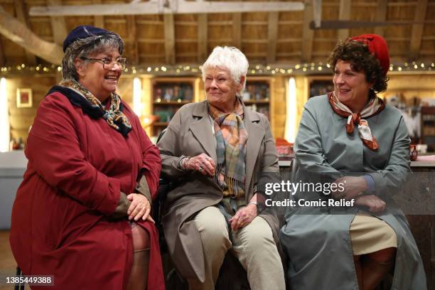 In this image released on March 15 Dame Judy Dench with Dawn French and Jennifer Saunders during the Repair Shop special for Comic Relief's Red Nose...