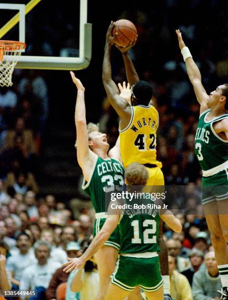 Lakers James Worthy takes a shot over Larry Bird during 1985 NBA Finals between Los Angeles Lakers and Boston Celtics, June 2, 1985 in Inglewood,...