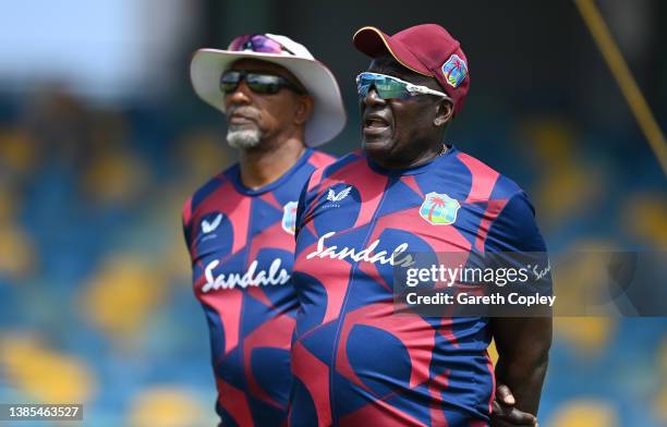 West Indies bowling coach Roddy Estwick with coach Phil Simmons during a nets session at Kensington Oval on March 15, 2022 in Bridgetown, Barbados.