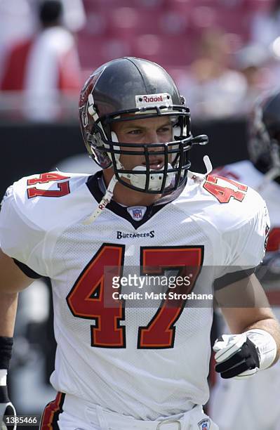Safety John Lynch of the Tampa Bay Buccaneers jogs on the field before the NFL game against the New Orleans Saints on September 8, 2002 at Raymond...
