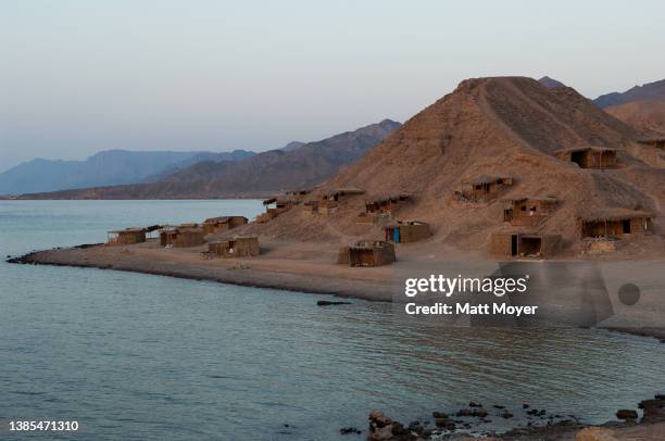 Views of Castle Beach and another camp with huts on a hill along the Gulf of Aquba near Nuweiba, Egypt on July 28, 2007. Castle Beach was the site of...
