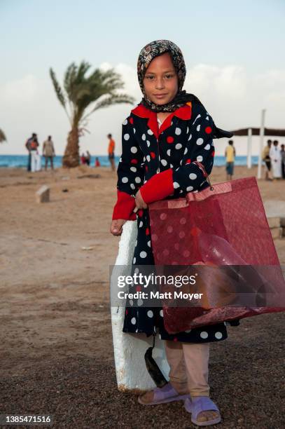 Amal Maher spends the day at the beach with her father in Nuweiba, Egypt on April 28, 2008.