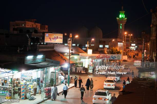 U2013 JUNE 6: A bustling street full of vehicles and pedestrians in downtown Al Arish, Egypt on June 6, 2008.