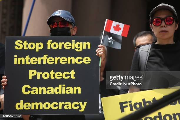 Chinese Canadians protest for the freedom of Hong Kong as Hong Kong marks the 26 year anniversary of the handover to China in Toronto, Ontario,...