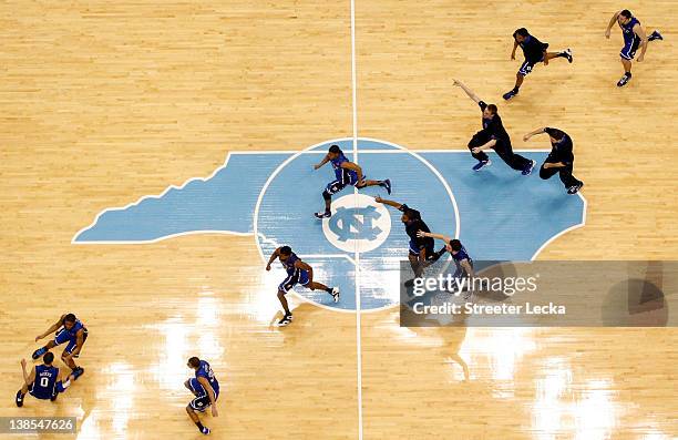 The Duke Blue Devils celebrate after Austin Rivers makes a game-winning 3 pointer as time expires to defeat the North Carolina Tar Heels 85-84 at the...