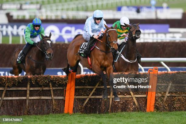 Rachael Blackmore on Honeysuckle jump the last fence before Aidan Coleman on Epatante and Paul Townend on Appreciate It to win The Unibet Champion...