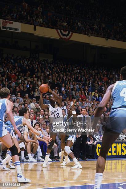 Tournament: Duke David Henderson in action vs North Carolina Michael Jordan during Semifinals at Greensboro Coliseum. Greensboro, NC 3/10/1984...