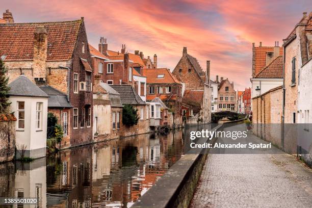 sunset by the canal in bruges, belgium - canal disney stock pictures, royalty-free photos & images