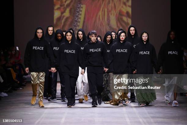 Designer Kilian Kerner and models walk the runway at the Kilian Kerner show during the Mercedes-Benz Fashion Week Berlin March 2022 at Kraftwerk...