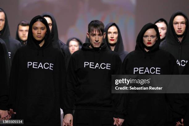 Designer Kilian Kerner and models walk the runway at the Kilian Kerner show during the Mercedes-Benz Fashion Week Berlin March 2022 at Kraftwerk...