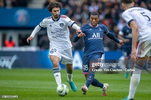 August 10: Georginio Wijnaldum of Paris Saint-Germain defended by Yacine Adli of Bordeaux during the Paris Saint-Germain Vs Bordeaux, French Ligue 1...