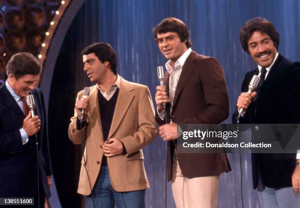 Host Mike Douglas, guests Bart Braverman, Robert Ulrich and co-host Tony Orlando appear on an episode the Mike Douglas Show in March 1981 in Los...