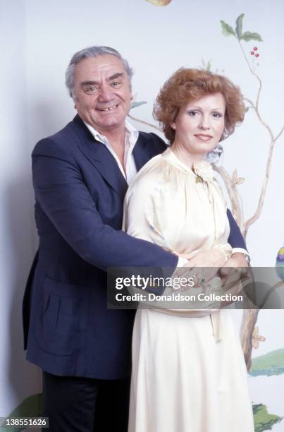 Actor Ernest Borgnine poses for a portrait with his wife Tova Traesnaes Borgnine at their home in circa 1980 in Los Angeles, California.