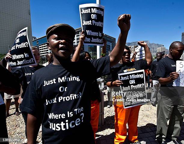 People protest outside the Cape Town International Convention Centre on February 8, 2012 in Cape Town, South Africa. The protestors are from the...