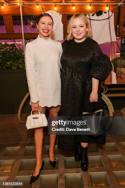 Bel Powley and Nicola Coughlan attend Provence inspired evening to celebrate the Longchamp Spring Summer '22 collection on March 15, 2022 in London,...