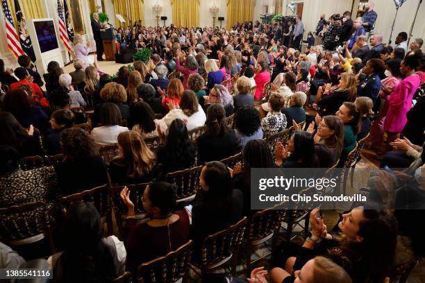 President Joe Biden addresses the East Room packed with members of the president's cabinet, members of Congress and current, former members of the...