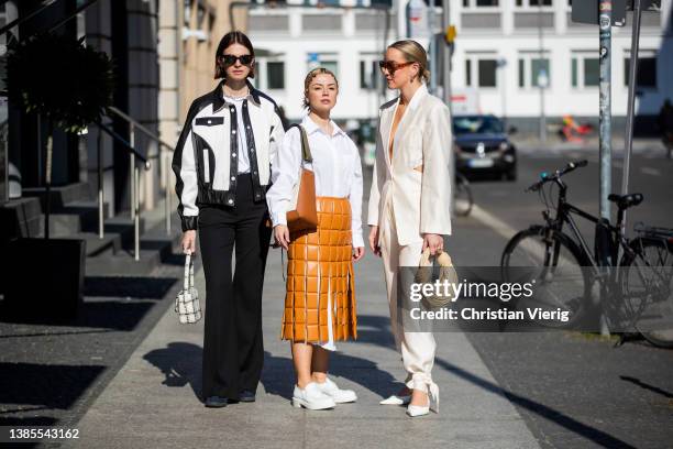 Jacqueline Zelwis seen wearing black white Mads Norgaard jacket, Arket T-Shirt, Lala Berlin flared pants, Anine Bing bag, House of Dagmar sunglasses,...