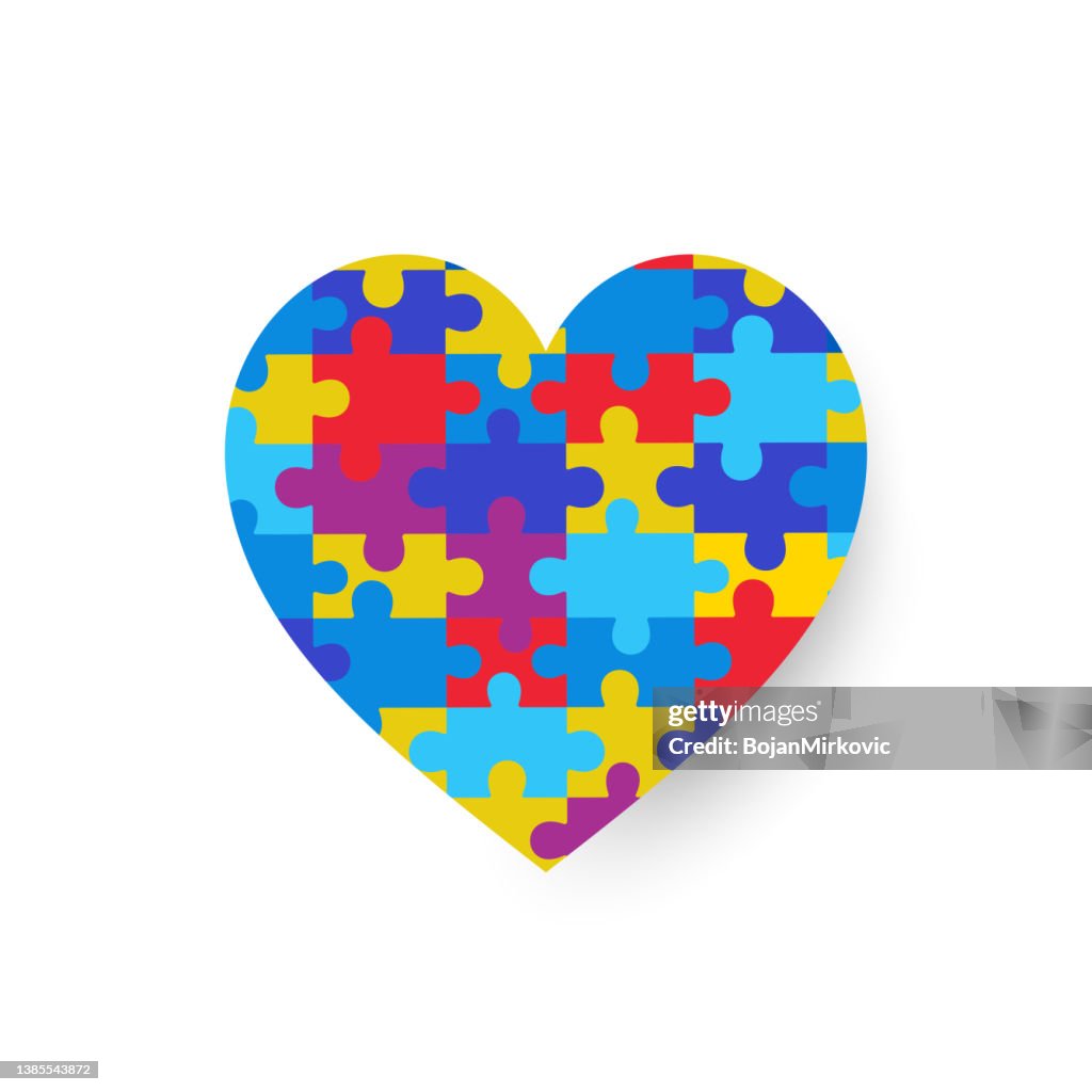 Multicolored puzzle heart puzzle. Vector