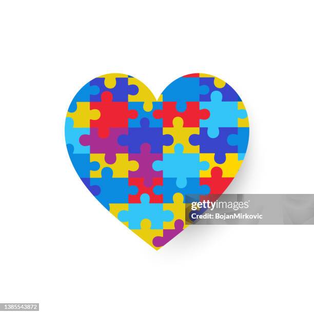 multicolored puzzle heart puzzle. vector - social awareness symbol stock illustrations