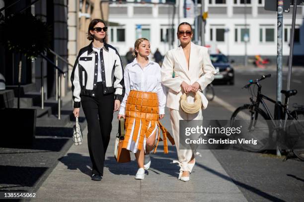 Jacqueline Zelwis seen wearing black white Mads Norgaard jacket, Arket T-Shirt, Lala Berlin flared pants, Anine Bing bag, House of Dagmar sunglasses,...